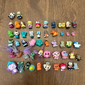Hatchimals CollEGGtibles Lot of 52 Assorted Hello Kitty Beauty Beast Sponge Bob